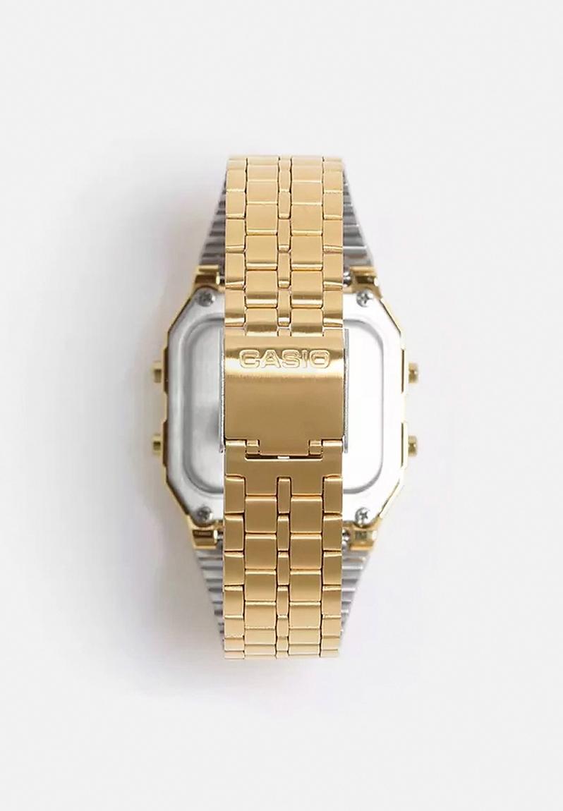 gold casio watch on wrist